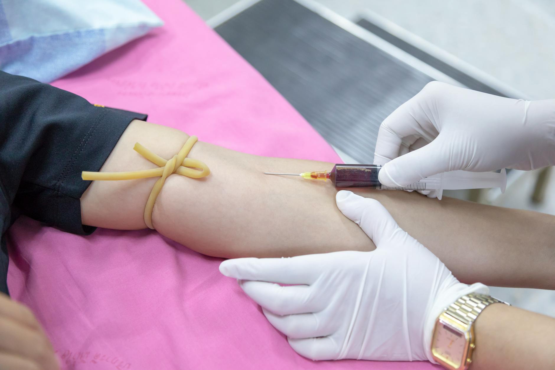 injecting of syringe on person s arm